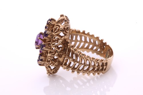 Lot 45 - A 9ct gold cocktail ring set with amethysts,...