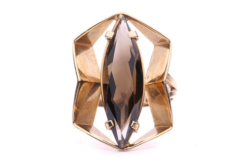 Lot 155 - A Modernist smokey quartz ring in 9ct gold,...