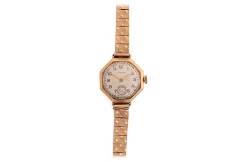 Lot 386 - A Cyma 9ct gold ladies wristwatch, the...