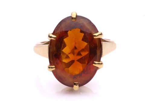 Lot 186 - A large citrine cocktail ring, consisting of...