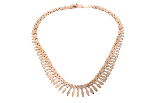 Lot 136 - A fringe necklace in 9ct yellow gold,...