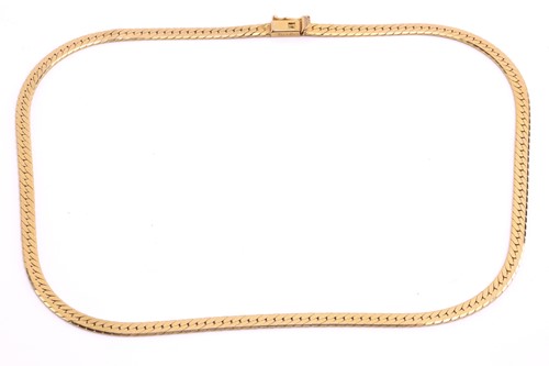 Lot 245 - A flat snake chain, fastened with a box clasp...