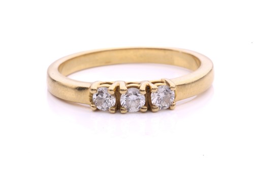 Lot 286 - A diamond 3-stone ring, with three claw set...