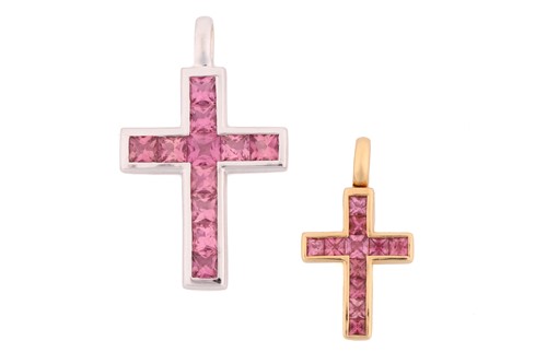 Lot 202 - Two synthetic pink sapphire cross pendants in...