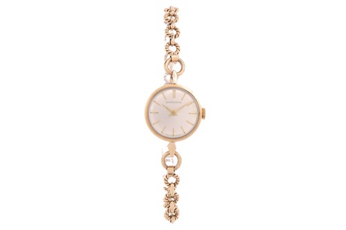 Lot 385 - A Garrard 9ct gold ladies wristwatch, the...