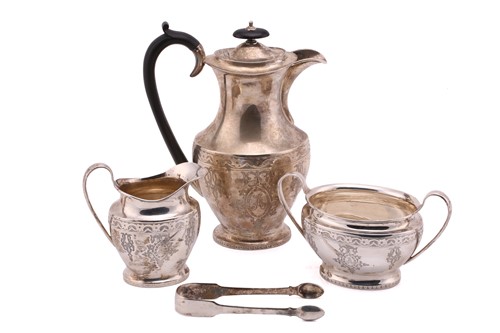 Lot 416 - A three piece silver tea set; oval with...