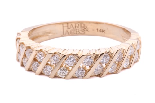 Lot 134 - A two-row diamond set ring, with graduating...
