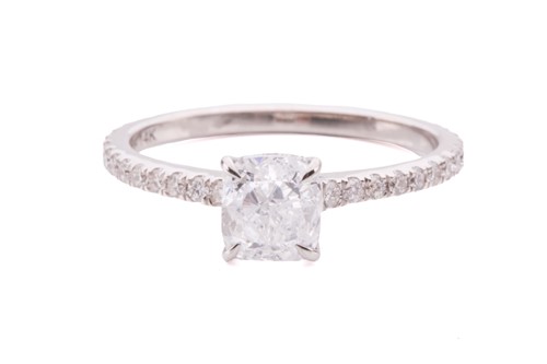 Lot 113 - A cushion-cut diamond ring with diamond set...