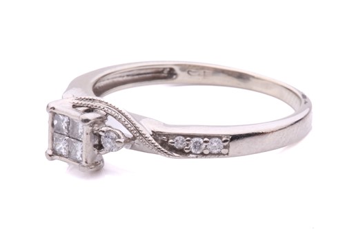 Lot 161 - A princess cut diamond set cluster ring with...