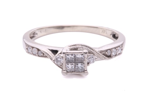 Lot 161 - A princess cut diamond set cluster ring with...