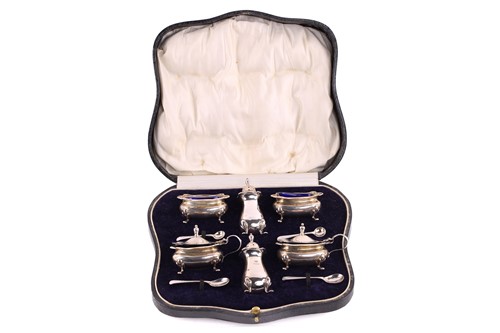 Lot 472 - A silver six piece cruet set in fitted case...