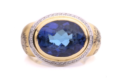 Lot 79 - Theo Fennell - A tanzanite and diamond dress...
