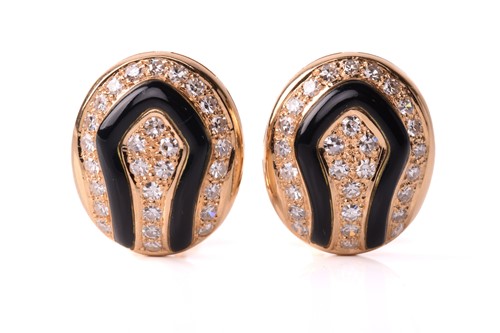 Lot 42 - A pair of diamond and onyx earclips, circa...
