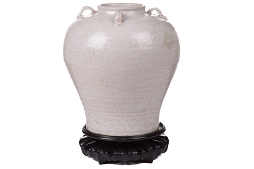 Lot 124 - A Chinese celadon inverted baluster vase, with...