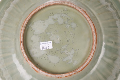 Lot 124 - A Chinese celadon inverted baluster vase, with...