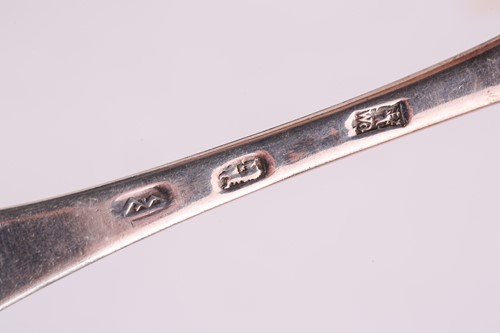 Lot 428 - A Queen Anne silver "dog nose" spoon, London,...