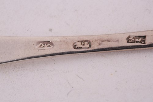 Lot 428 - A Queen Anne silver "dog nose" spoon, London,...