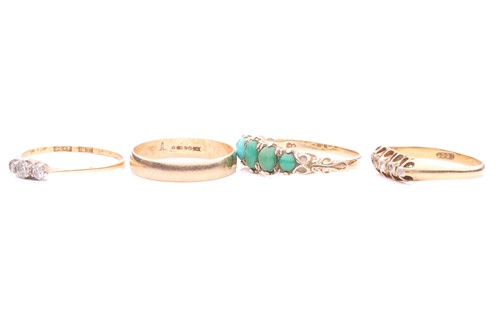 Lot 52 - A collection of four gem-set rings; including...