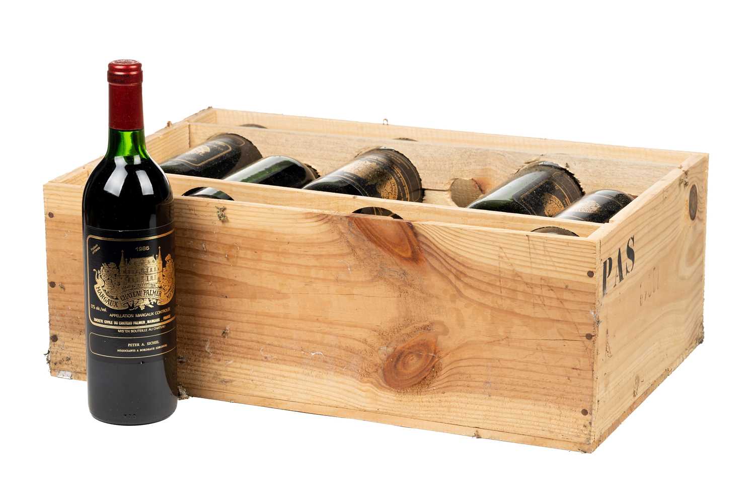 Lot 13 - A twelve-bottle case of Chateau Palmer,...