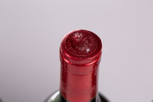 Lot 13 - A twelve-bottle case of Chateau Palmer,...