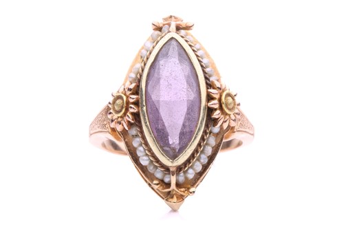 Lot 185 - An amethyst and seed pearl dress ring,...