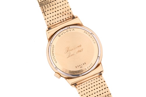 Lot 342 - An 18ct gold Bulova Accutron wristwatch, the...