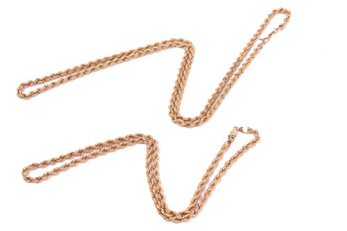 Lot 3 - Two twisted rope chains in 9ct gold, one...