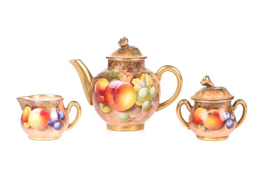 Lot 132 - A Royal Worcester fruit-decorated three-piece...