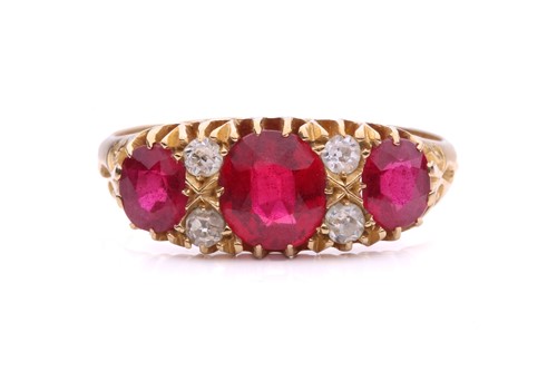 Lot 220 - A synthetic ruby and diamond half-hoop ring in...