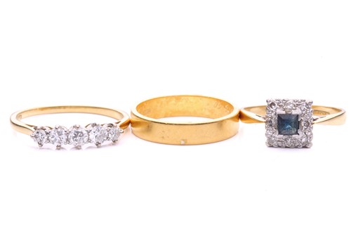 Lot 153 - A 22ct gold wedding band and two 18ct gold gem-...