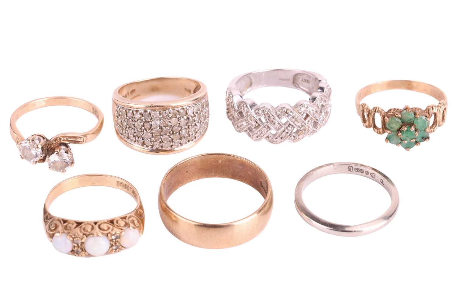 Lot 45 - A collection of seven rings, comprising a...