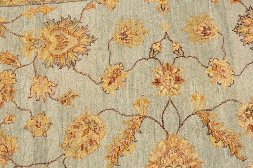 Lot 267 - An Indian pale blue ground hand-knotted carpet,...
