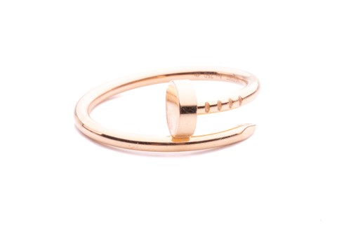Lot 113 - Cartier - a Juste un Clou ring in 18ct rose...