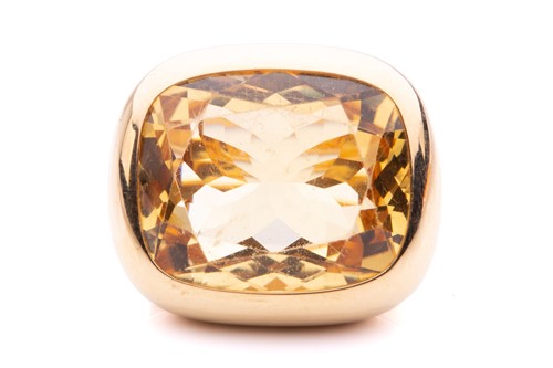 Lot 29 - A large citrine cocktail ring, presenting a...