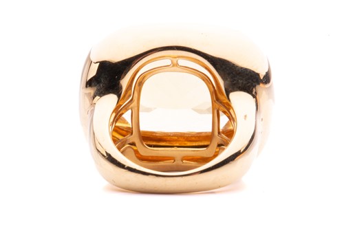 Lot 29 - A large citrine cocktail ring, presenting a...