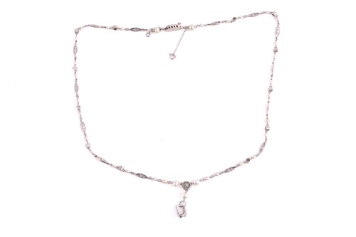 Lot 107 - An Art Deco chain necklace set with pearls and...