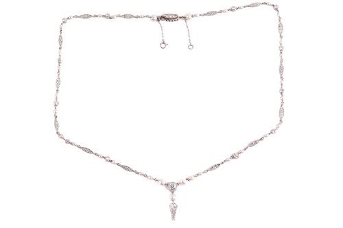 Lot 107 - An Art Deco chain necklace set with pearls and...