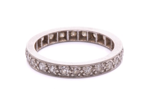 Lot 148 - A diamond eternity ring, pavé-set with...