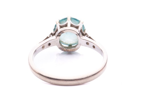 Lot 18 - A blue zircon and diamond dress ring, centred...