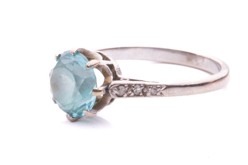 Lot 18 - A blue zircon and diamond dress ring, centred...