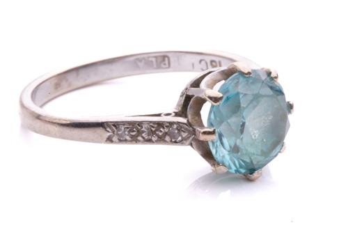 Lot 18 - A blue zircon and diamond dress ring, centred...