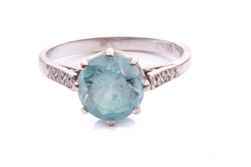 Lot 18 - A blue zircon and diamond dress ring, centred...