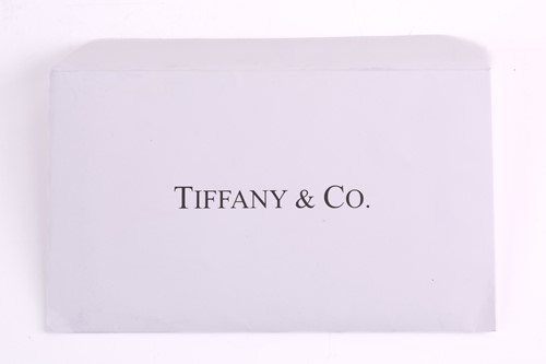 Lot 226 - Tiffany & Co. - a brilliant-cut solitaire...