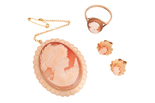 Lot 144 - A shell cameo brooch, earrings and ring suite...