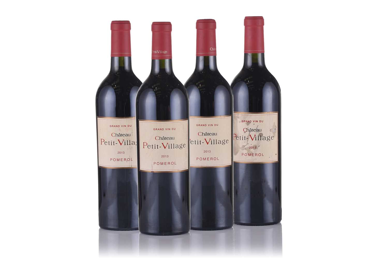 Lot 20 - Four bottles of Chateau Petit Village 2013...