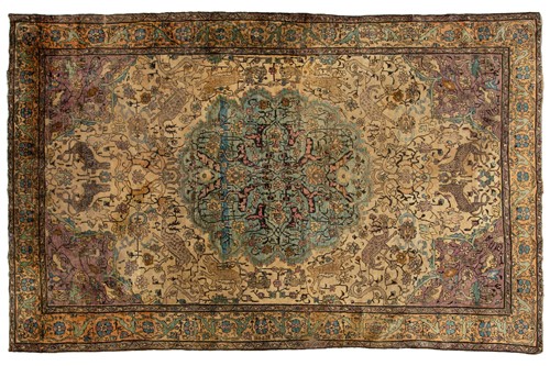 Lot 365 - An antique Kashan silk on-silk rug with a...