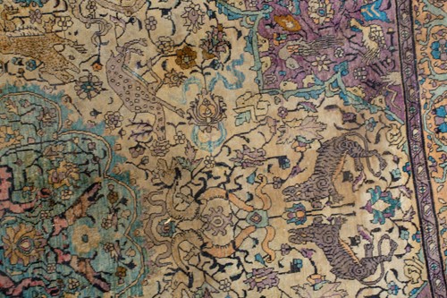 Lot 365 - An antique Kashan silk on-silk rug with a...