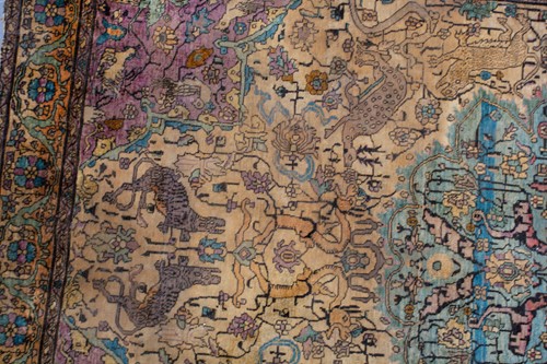 Lot 365 - An antique Kashan silk on-silk rug with a...