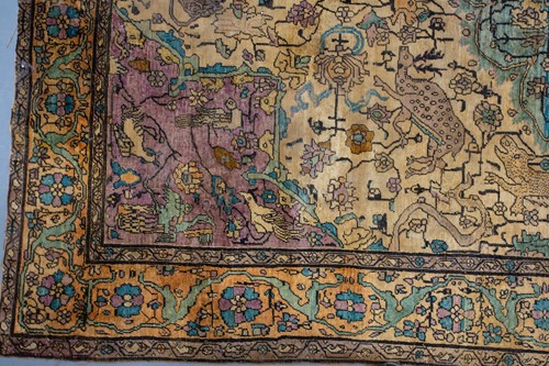 Lot 365 - An antique Kashan silk on-silk rug with a...