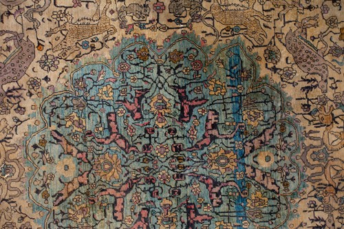 Lot 365 - An antique Kashan silk on-silk rug with a...